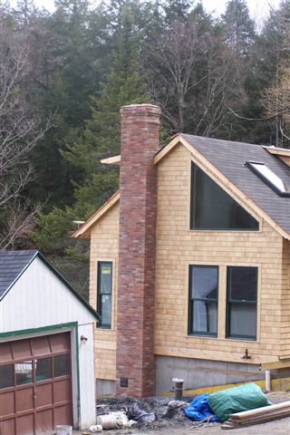Brick chimney on a newly constructed home
